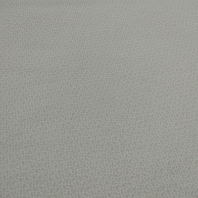 Superfície texturizada cinza claro e bege com padrão irregular