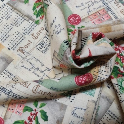 Tecido estampado com motivos de postais antigos, calendários e selos coloridos