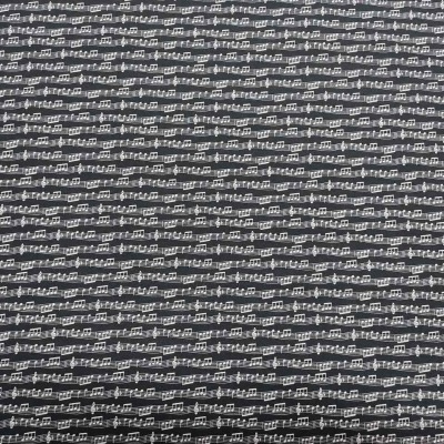 tecido preto com padrão de notas musicais brancas