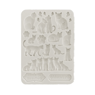 Moldes de silicone com formas de gatos e textos em inglês