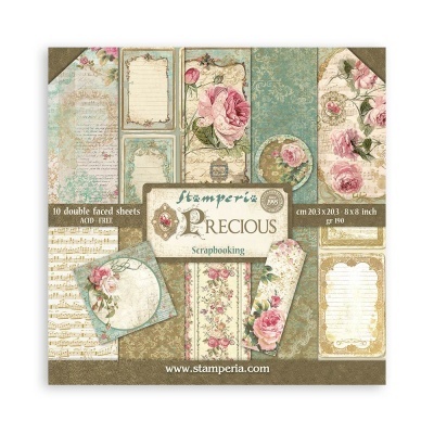 Conjunto de folhas para scrapbooking com motivos florais e molduras decorativas em tons pastel e dourados.