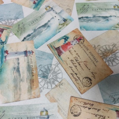 tecido com padrão de postais antigos e faróis coloridos