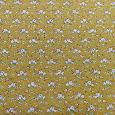 tecido amarelo com padrão floral pequeno colorido