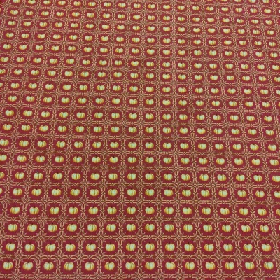 Tecido vermelho com padrão quadrado amarelo e branco