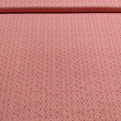 Tecido rosa com padrões geométricos pretos pequenos repetidos
