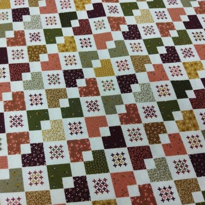 Padrão quadriculado colorido em tecido ou papel de parede com pequenos padrões geométricos