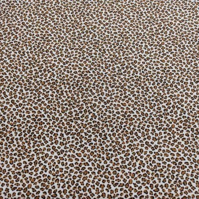 Tecido estampado com padrão de manchas de leopardo