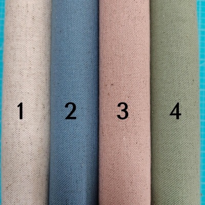 Rolos de tecido colorido numerados de 1 a 4 alinhados verticalmente