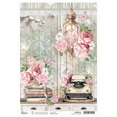 Mesa branca com livros, flores cor-de-rosa, máquina de escrever antiga creme e parede decorativa com flores e lâmpada dourada