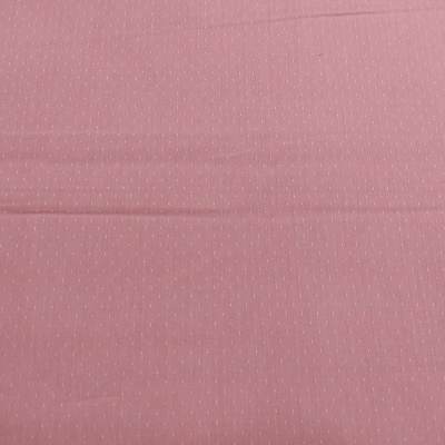 tecido rosa com pontos brancos pequenos