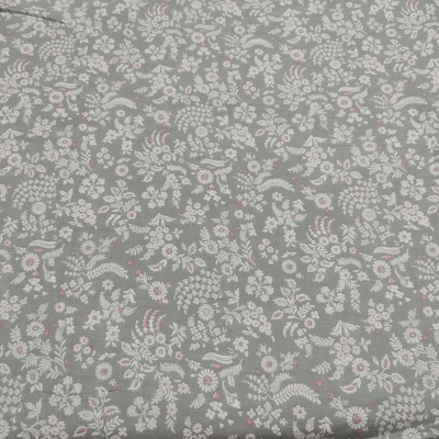 Tecido cinzento com padrão floral branco e rosa