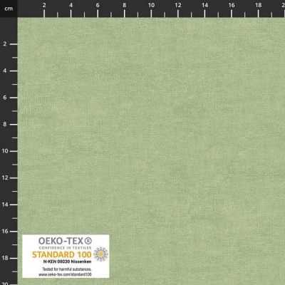 tecido verde claro com textura lisa e etiqueta OEKO-TEX® STANDARD 100