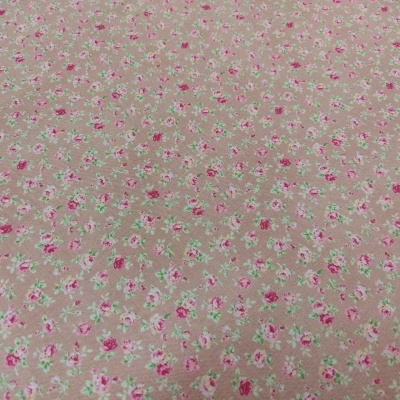 tecido floral bege com flores cor-de-rosa e brancas