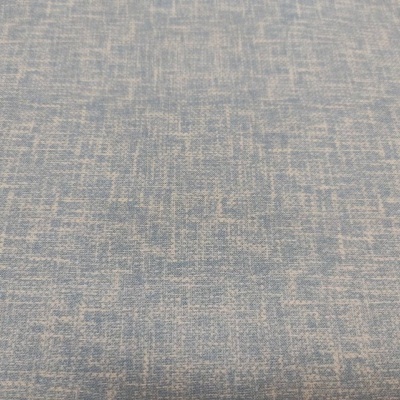Tecido azul claro texturizado com padrão irregular