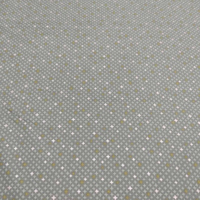 Tecido cinzento com padrão de estrelas brancas e douradas