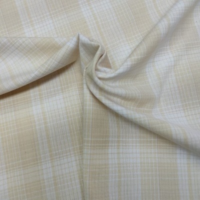 tecido bege com padrão de riscas em branco