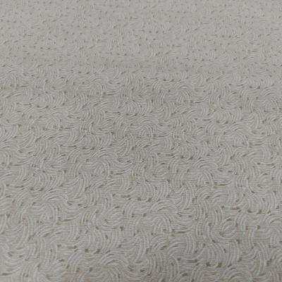 Tecido bege com padrão de ondas em relevo