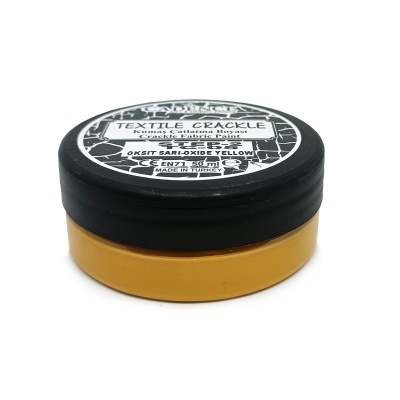 Frasco pequeno de tinta amarela para têxteis com tampa preta e etiqueta preta e branca