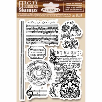 Conjunto de carimbos musicais em borracha com padrões ornamentais em caixa transparente.