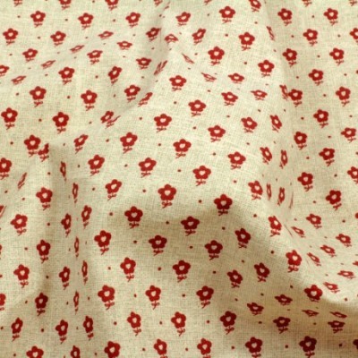 tecido bege com flores vermelhas pequenas e padrão repetitivo