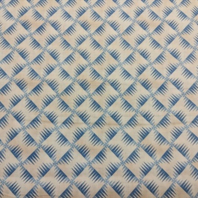 Tecido com padrão geométrico azul e branco