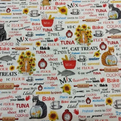 Tecido estampado com motivos de cozinha e textos coloridos em fundo branco