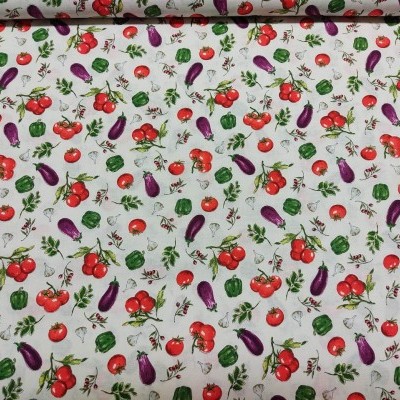 Tecido com padrão de vegetais coloridos em fundo branco