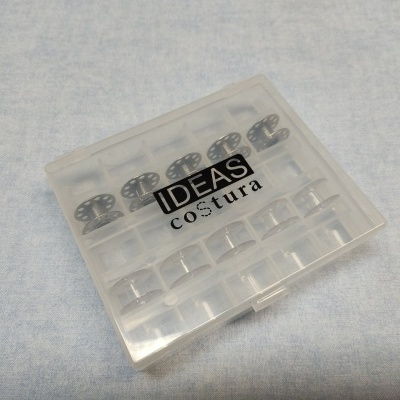 Caixa de bobinas de linha transparentes para costura com texto IDEAS costura