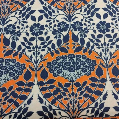 Tecido floral azul e laranja com padrão geométrico