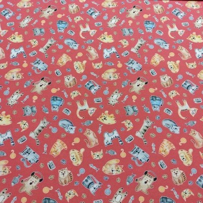 Tecido vermelho com padrão de cães coloridos em várias poses