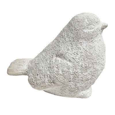 Escultura decorativa de pedra branca em forma de pássaro