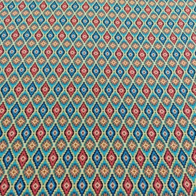 Tecido com padrão geométrico colorido em losangos