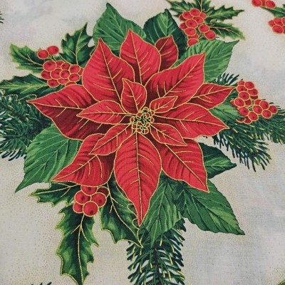Tecido decorativo com padrão natalício de poinsétia vermelha e folhas verdes