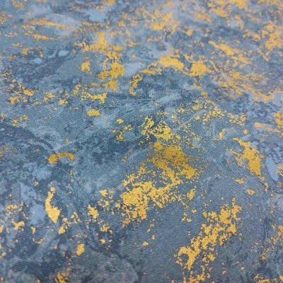 tecido azul com padrão dourado irregular e textura suave