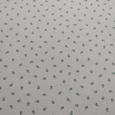 Tecido branco com padrão de pequenas flores cinzentas
