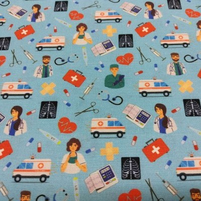 Tecido azul com padrão médico colorido