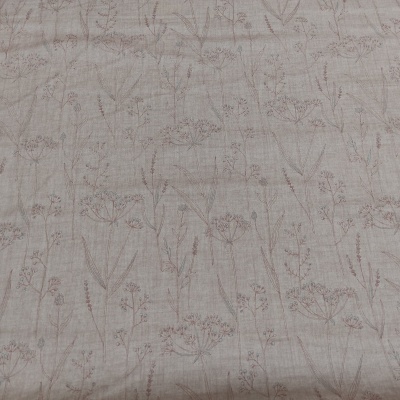 tecido bege com padrão de plantas castanhas