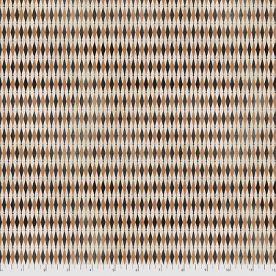 Tecido com padrão de losangos castanhos, pretos e beges com régua em centímetros.