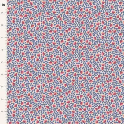 tecido floral azul vermelho branco com régua métrica