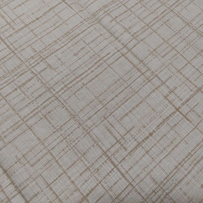 Tecido decorativo bege com padrão geométrico cruzado