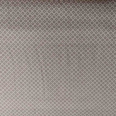 Padrão repetitivo de círculos pretos sobre fundo cinzento claro