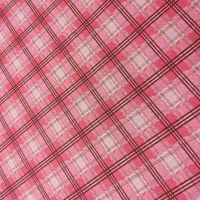 Tecido rosa xadrez com linhas vermelhas, castanhas e douradas