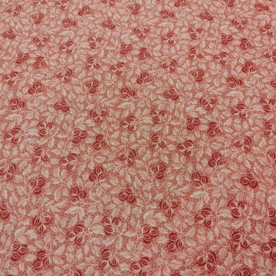 Tecido com padrão floral vermelho e rosa