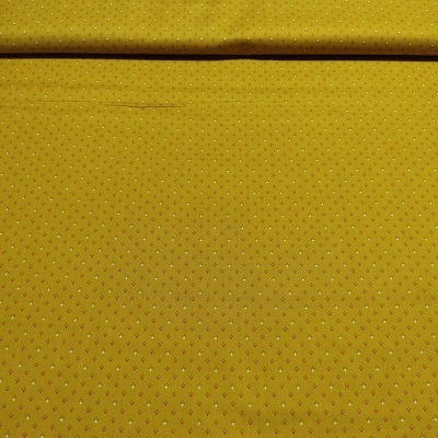 Tecido amarelo ocre com pequena estampa floral