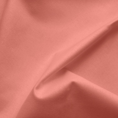 Tecido coral com textura suave e rugas