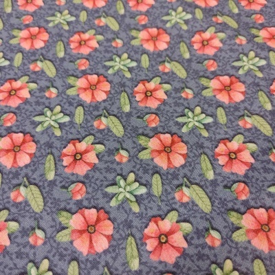 Tecido com padrão floral em fundo azulado