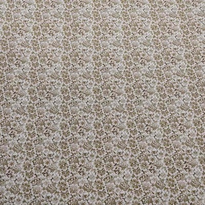 Tecido floral castanho e bege sobre fundo creme