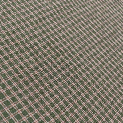 Tecido xadrez verde-escuro, branco e rosa