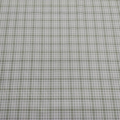 Tecido xadrez cinza e branco sobre superfície plana