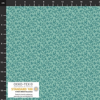 Tecido azul claro com padrão de folhas em azul escuro e etiqueta OEKO-TEX